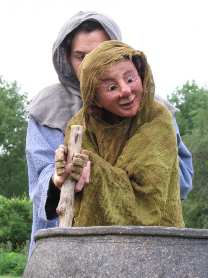 Puppet from Taliesin stirring a cauldron. (Credit: Mettawee Theatre Company)