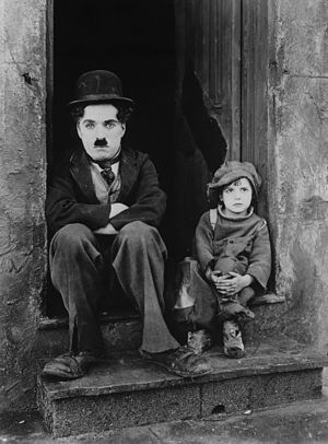 Charlie Chaplin and Jackie Coogan in The Kid (Photo credit: Wikipedia)