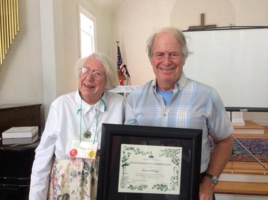 Pictured here, Happy Marsh presents author and Illustrator Steven Kellogg with Essex County Garden Club’s GCA Commendation at the Club’s recent meeting held in Keene.