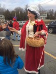 The Magic of Christmas in Essex 2015: Mrs. Clause gives candy canes to children