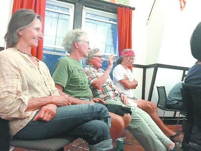 North Country farmers and locals take part in the Essex Farm Institute’s inaugural public forum at the Whallonsburg Grange Hall Monday night. (Credit: Adirondack Daily Enterprise)
