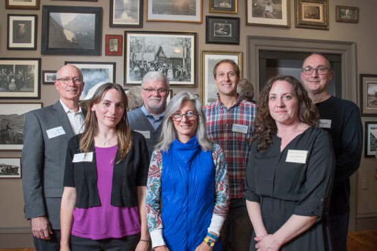 (Back row) Curator Dan Keegan, Photographers Ed Williams, Johnathan Esper, Tony Beaver, (front row) Jessica Tabora, Nancie Battaglia and Museum Director Aurora McCaffrey were on hand to celebrate the Adirondack History Museum’s opening with a gala reception for “A Sense of Place: Photography of the High Peaks Region.” (Photo provided by Barry Goldstein)