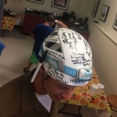 James in helmet signed by friends after his accident. (Credit: Tom Duca)