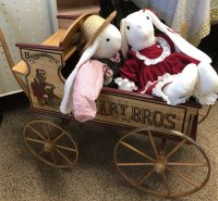 Plush bunnies in wagon