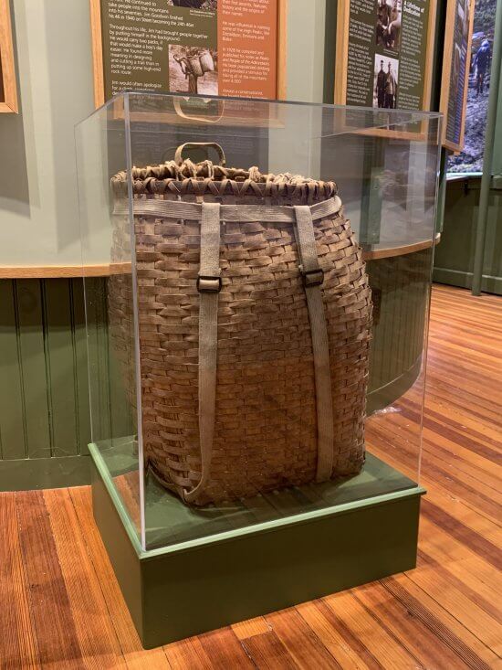 Pack basket of Jim Goodwin on display in the Hiking Exhibit