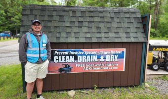 The easiest way for the public to ensure their boat meets the "Clean, Drain, Dry, Certify" standard is to visit a Watercraft Inspection Steward at a boat decontamination station. There are several located across the Adirondack region and a boat wash is free. (Photo credit: PSC AWI)